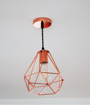 A modern style red, wireframed chandelier
